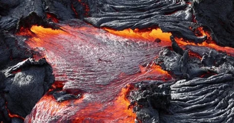 Molten lava close-up motion magma flow nature mountain volcano footage Stock Footage 336579962
