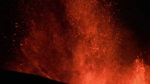 Molten lava exploding from a volcano crater in Iceland Stock Footage 330283647