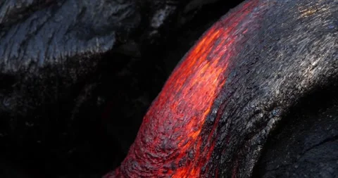 Molten lava flowing close up surface cold flow Hawaii Volcanoes magma Video stock 336580203