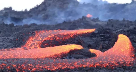 Molten lava flowing close up surface cold flow Hawaii Volcanoes magma Stock Footage 336580350
