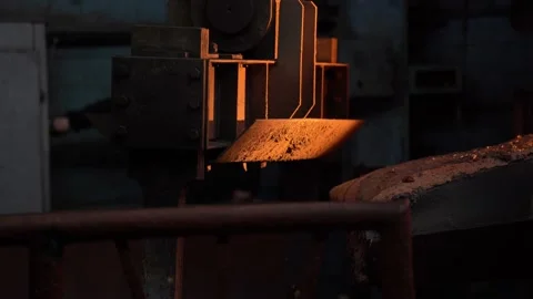 Molten liquid metal flows down the guide to the crucible, steel production,  Stock Footage 155983586