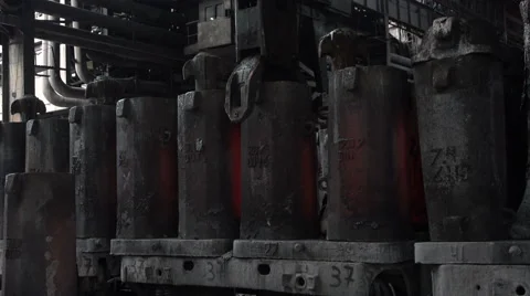 Molten workpiece withdrawn from the forms on the carriage to the platform  Stock Footage 61837494