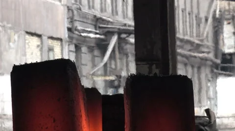 Molten workpiece withdrawn from the forms on the carriage to the platform  Stock Footage 61986457