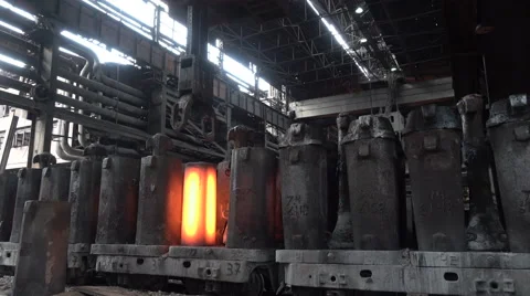Molten workpiece withdrawn from the forms on the carriage to the platform  Stock Footage 62210134