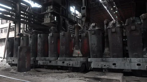 Molten workpiece withdrawn from the forms on the carriage to the platform  Stock Footage 62261092