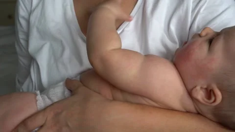Mom and baby in arms Stock Footage