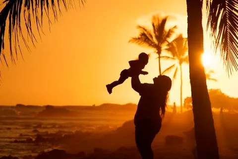Mom and Baby Sunset in Hawaii Stock Photos