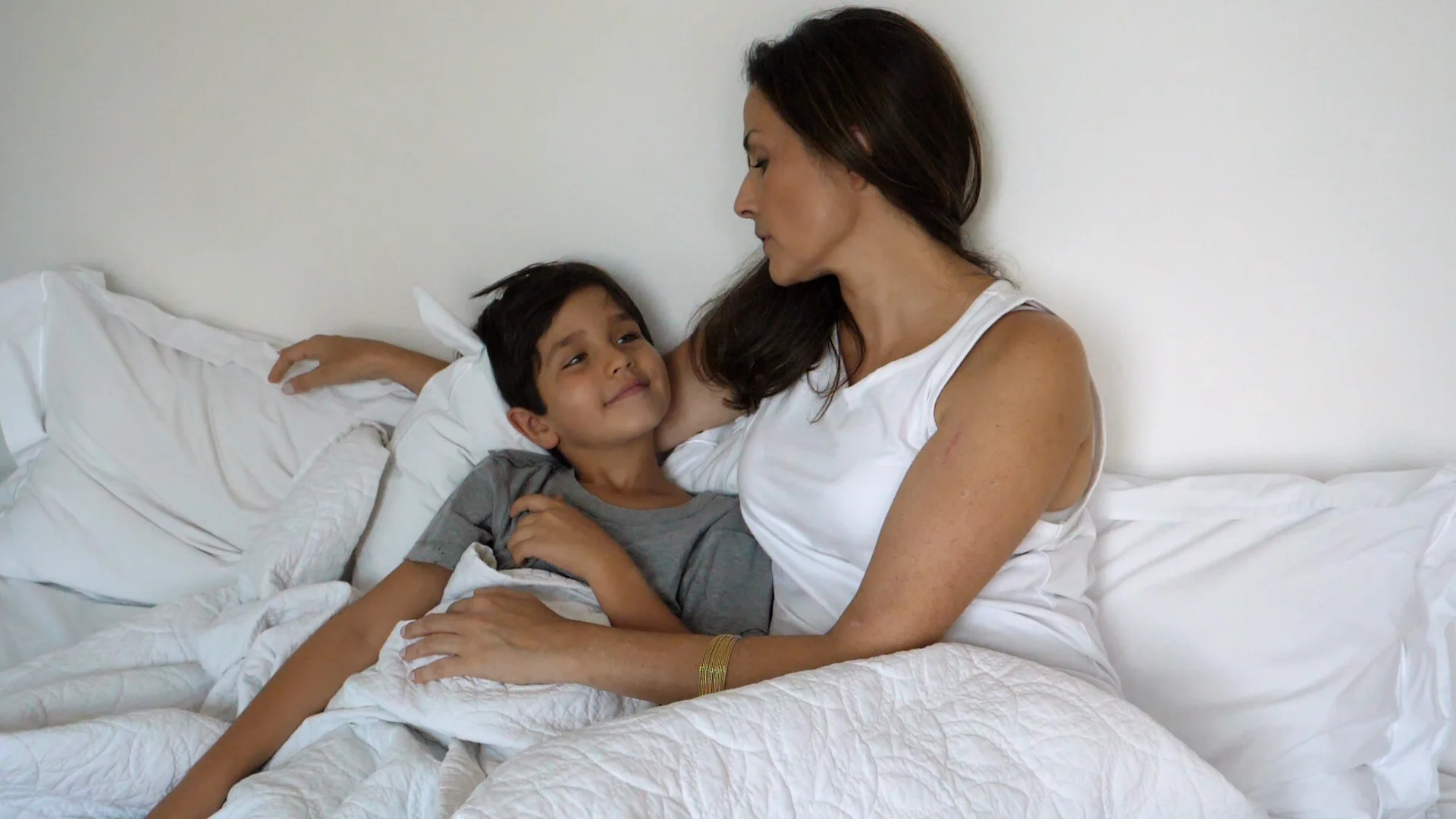 Mom and son lazy morning | Stock Video | Pond5