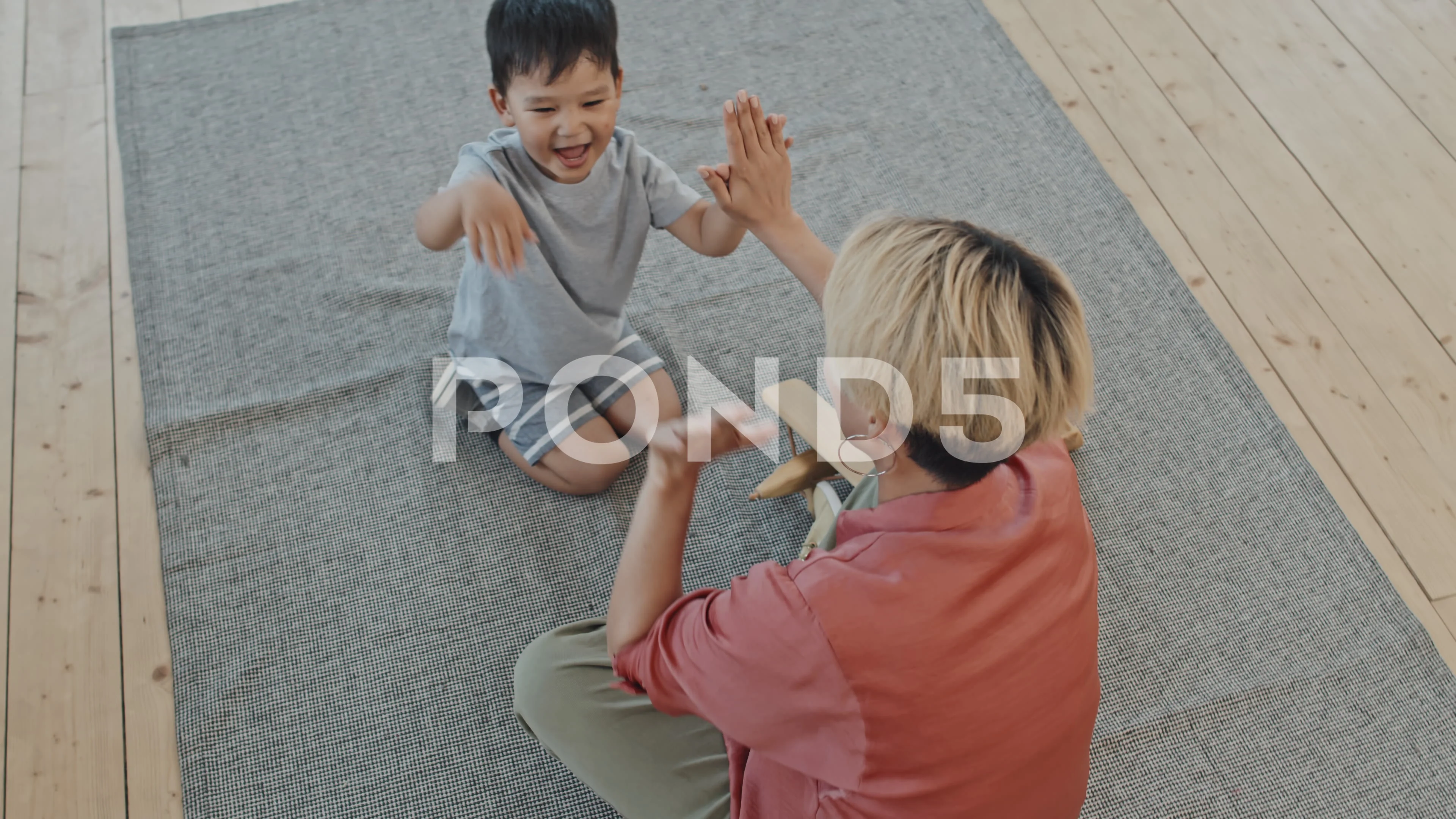 Mom and Son Playing Pat-A-Cake Game