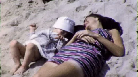 MOM BABY DAUGHTER Beach Sand 1950s Vintage Amateur Film Home Movie 8mm Stock Footage