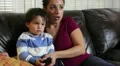 Mom changing TV channels HD Footage