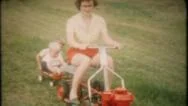 Mom Cuts The Grass And Watches The Kids 1950S Vintage Home Movie  2381 Stock Footage