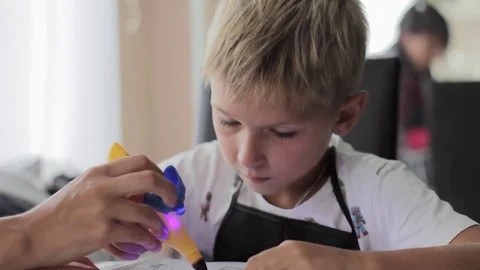 Mom helping his son to do his homework Stock Footage 79619566