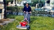 Mom Helps Dad Mow The Lawn With New Mower 1950S Vintage Film Home Movie 4705 Stock Footage
