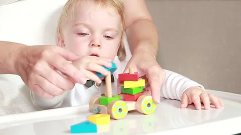 Mom helps Stock Footage 138642312