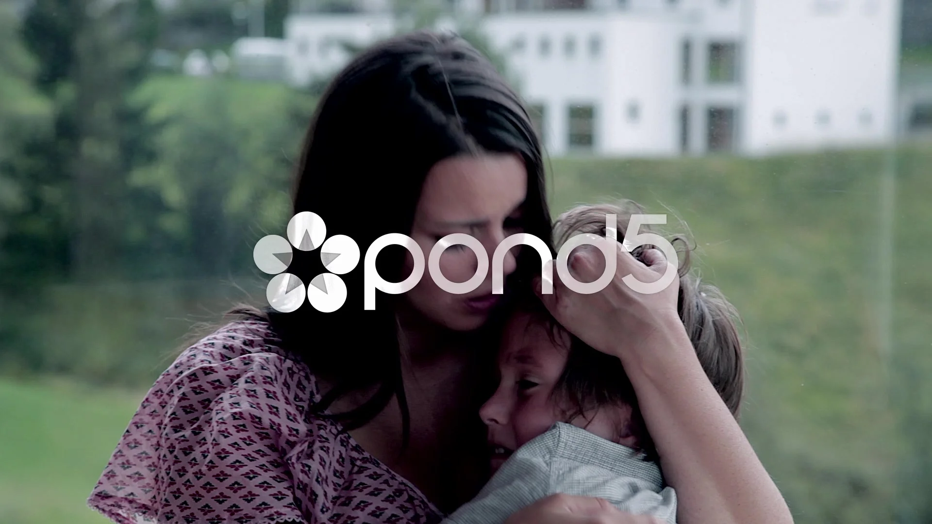 Mom hugging and talking to little child ... | Stock Video | Pond5