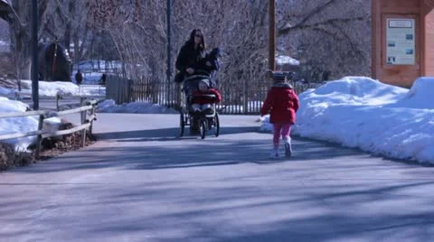 Mom lets go a stroller and it gets away Stock Footage 21305552