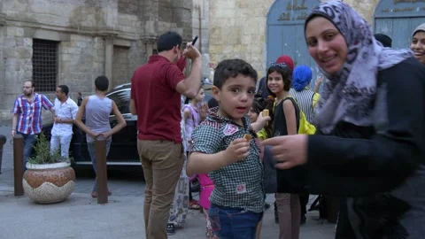 Mom Posing With Child Inside Khan el-Khalili Market In Cairo, Egypt Stock Footage 157994748