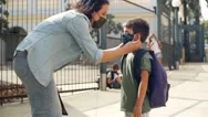 Mom Puts Her Son's Face Mask On The First Day Of Primary School. Stock Footage