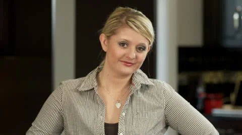 Mom Smiles and gazes Stock Footage
