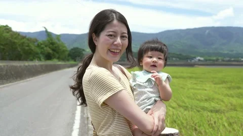 Mom is talking to the camera with joy Stock Footage 154445748