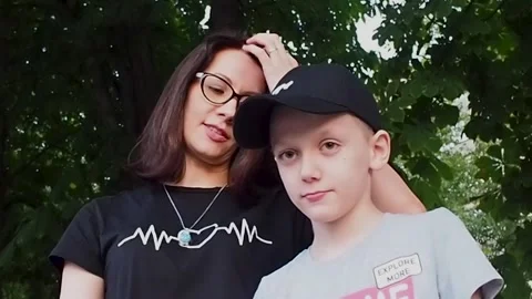 Mom talking to son Stock Footage 202235352