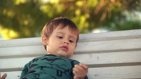 Mom with two year old son eat ice cream Stock Footage 118550601