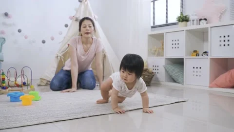 Mom watching and clapping happily Stock Footage 149074199