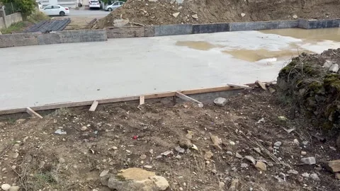 A moment during the initial phase of construction when work was paused due to Video stock 348682058