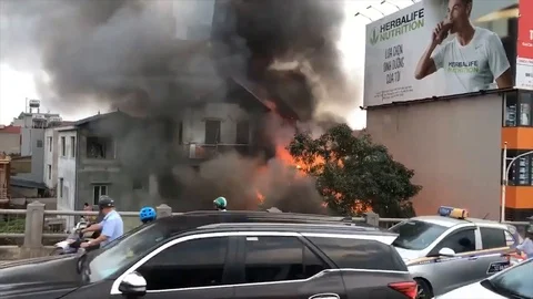 Moment petrol station explodes in massive fireball in Vietnam Stock Footage 106316838