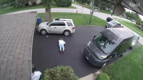 Mom's Face Meets The Driveway, Chicago, Illinois, USA - 05 Sep 2022 Stock Footage 236706897