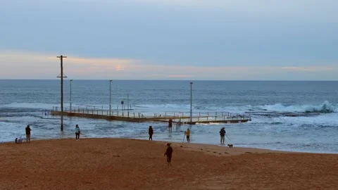 Mona Vale beach rock pool on Sydney Northern beaches at sunrise as 4k. Stock Footage 153784634