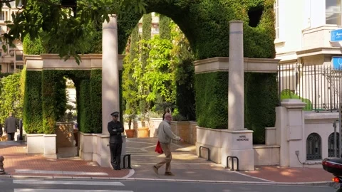 Monaco Elegant Garden Walkway With Columns and People 4K Video stock 331860929