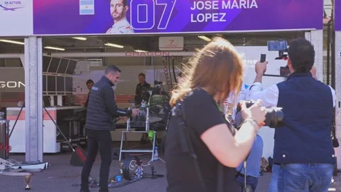 Monaco Formula One Pit Lane With Team Members and Garages 4K Stockbeeldmateriaal 334117463