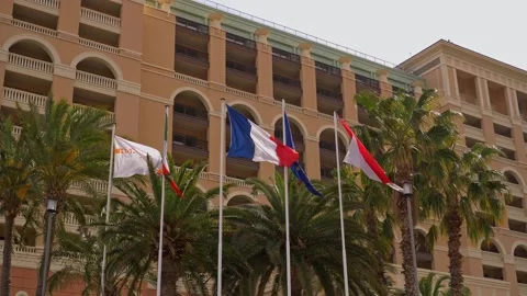 Monaco Luxury Hotel With Flags and Palm Trees 4K Видео 334117280