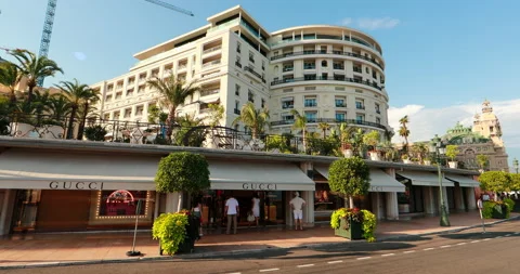 Monaco, Monte-Carlo, 21 August 2017: Tourists and wealthy people visit branded Stock Footage 175949602