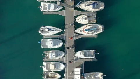 Monaco Top down aerial tracking shot of jetty with boats and people Stock Footage 119537236