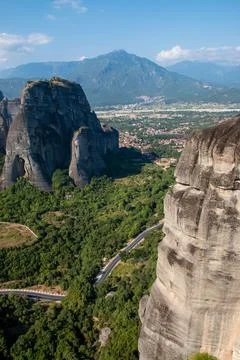 Monasteries built on cliffs, Meteora on a hot summer day, Greece Stock Photos