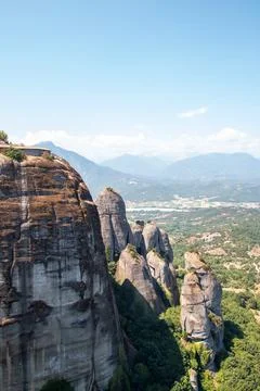 Monasteries built on cliffs, Meteora on a hot summer day, Greece Stock Photos