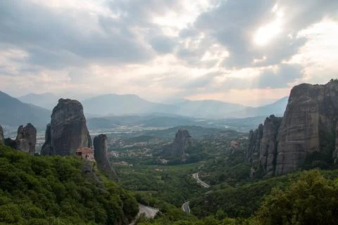 Monasteries built on cliffs, Meteora at sunset, Greece Stock Photos