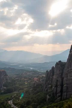 Monasteries built on cliffs, Meteora at sunset, Greece Stock Photos