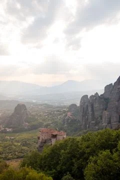 Monasteries built on cliffs, Meteora at sunset, Greece Stock Photos