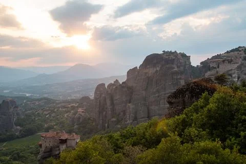 Monasteries built on cliffs, Meteora at sunset, Greece Stock Photos