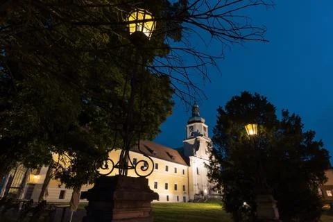 Monastery and palace complex in Poland in the evening. Stock Photos