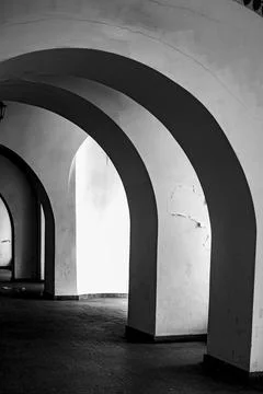 Monastery cloister arcade with repeating rounded arches, Kraków, Poland Photos