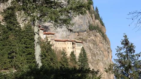 Monastery forest cliff Stock Photos