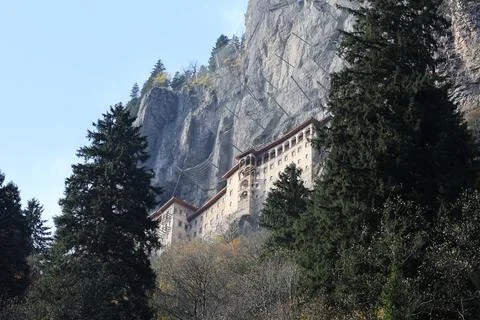 Monastery forest cliff Stock Photos