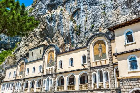 Monastery Ostrog in cliffs Stock Photos