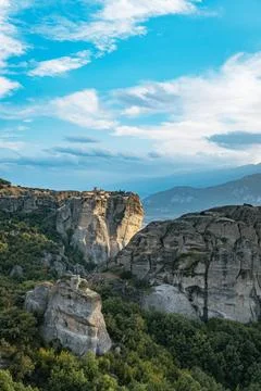 Monastery Perched on Steep Rock Formation Stock Photos