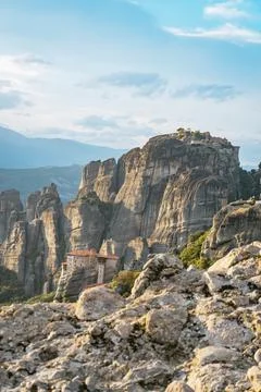 Monastery Perched on Steep Rock Formation Stock Photos
